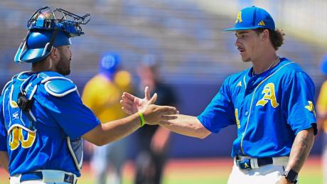 Angelo State's Chris Bernal (left) and Isaac Godard celebrate after a 12-2 win over Texas A&M-Kingsville in the opening round of the LSC Tournament on Monday, May 4, 2026.