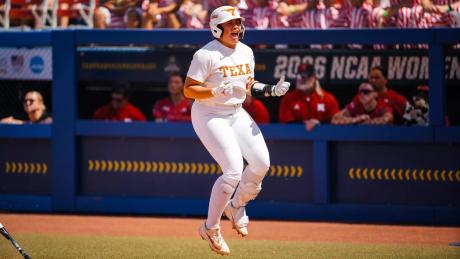 Texas' Katie Stewart celebrates after a home run over Nebraska in the 2026 College World Series.
