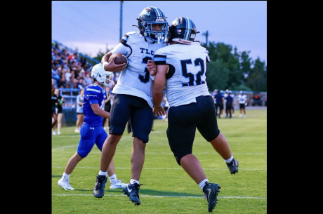 TLCA San Angelo's Collin Soto (52) and Jonah Munoz (3) celebrate during a win over Winters on Sept. 10, 2026.
