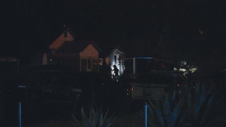 The standoff on E. 20th St. in May 2020. SWAT enters the building.