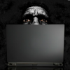 Disturbed Individual Watching a Computer Screen (Courtesy/Google)