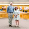 Santa Rita Elementary teacher Lynn Springer, San Angelo ISD’s 2024 Elementary Teacher of the Year, stands with Superintendent Dr. Chris Moran following her recognition at the June 16 school board meeting. (Photo by: San Angelo ISD)