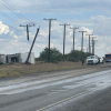 A rollover crash in Grape Creek on Thursday knocked out a utility pole and resulted in the driver being taken to the hospital.