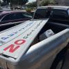 A sign advertising the recall petition of Mayor Tom Thompson in the back of Richard Summers' rusty, old Dodge pickup. He drove to city hall to deliver only 2/3s the petitions required to recall Mayor Tom Thompson.