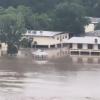 The Guadalupe River in Kerr County surged over its banks Thursday, July 16, 2026.