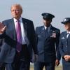 U.S. President Donald Trump waves to supporters after disembarking Air Force One at Ellington Field Joint Reserve Base in Houston on Aug. 27, 2026.
