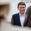 Democratic U.S. Senate nominee James Talarico talks to local officials after a campaign stop in Sanderson on July 13, 2026