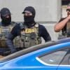 Immigration and Customs Enforcement agents in North Austin after a person was shot earlier on Sunday, Sept. 20, 2026.