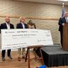 Colorado City Mayor Ruben Hurt is at the podium. To his right, from left to right, are Fluidstack's Kate Fraco, Anthropic's Ryan Wilson, and Cipher Digital CEO Tyler Page. (LIVE! Photo/Joe Hyde) 