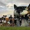 The Water Valley Wildcats run onto the field during the 2026 season.