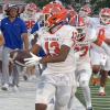 Central Bobcats' Gio Walker after an interception against Mansfield Lake Ridge
