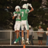 Wall's Hudson Surber (28) celebrates a touchdown catch with Braylon Nelson (7) against Ozona on Friday, Sept. 18, 2025.