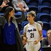 Angelo State women's basketball coach Alesha Ellis talks to Majik Esquivel during the 2025-26 season.