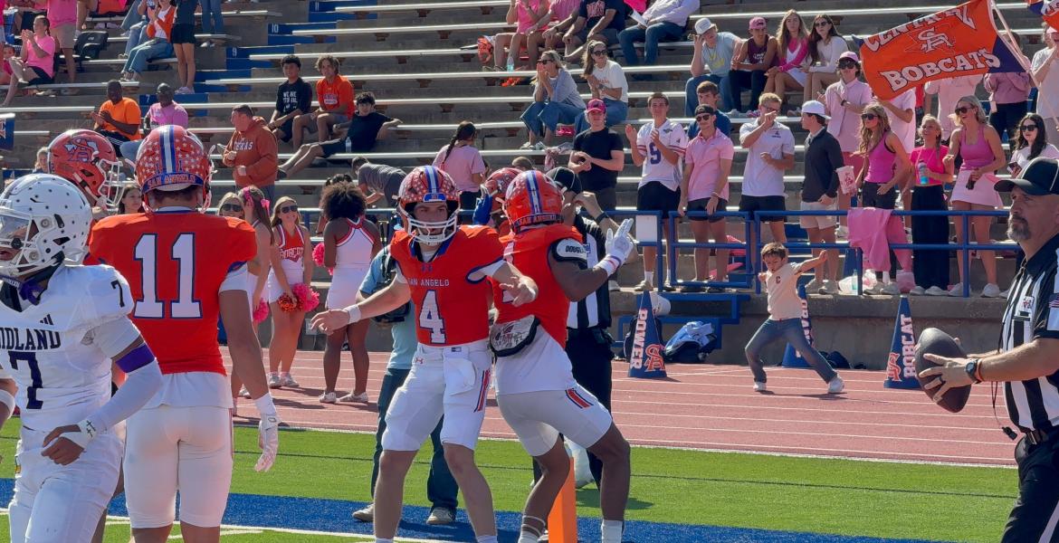Central quarterback Micah Smith (4) celebrates with wide receiver Gabriel Garcia (1) after a touchdown pass against Midland High on Saturday, Oct. 25, 2025.