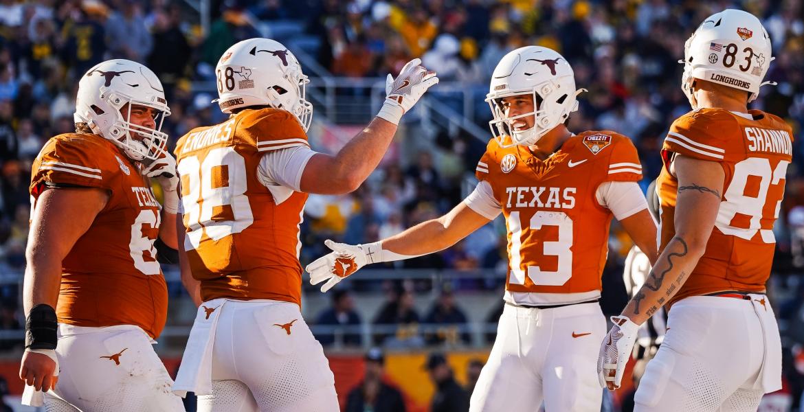 The Texas Longhorns celebrate during their Citrus Bowl win over Michigan on Wednesday, Dec. 31, 2025.