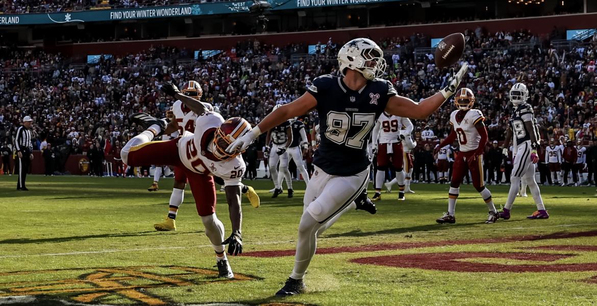 Dallas Cowboys' Jake Ferguson catches a touchdown pass against the Washington Commanders