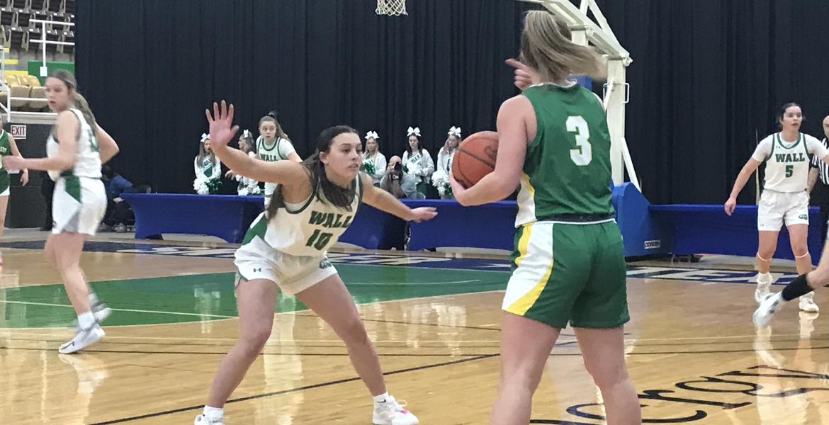 Wall's Kylee Holik guards Idalou's Preslie Wall during their regional semifinal game Tuesday in Snyder.
