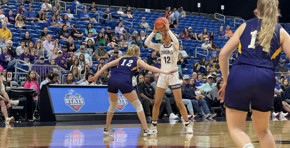 Mason's Flora Appleton looks for room against the defense of Panhandle's Addison McCoid in the state final Thursday, March 5, 2026.