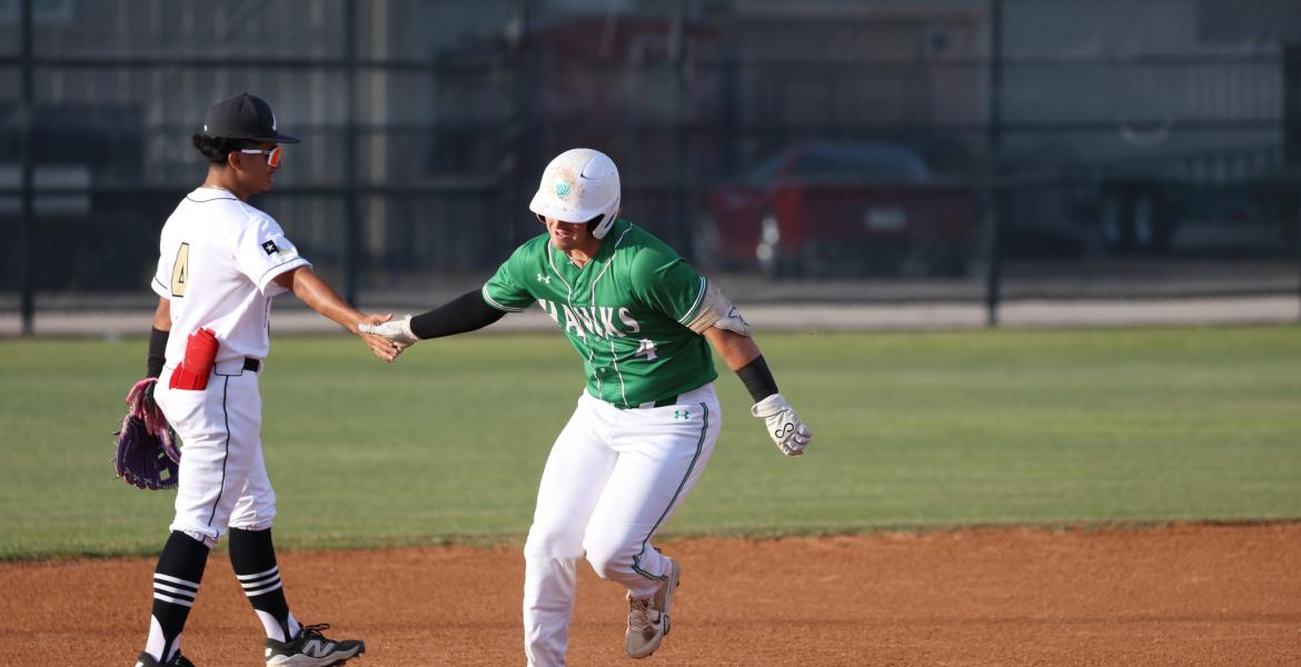 Abilene High second baseman Xavier De La Cruz congratulates Wall's Reid Ballard after his home run Friday, April 10, 2026.