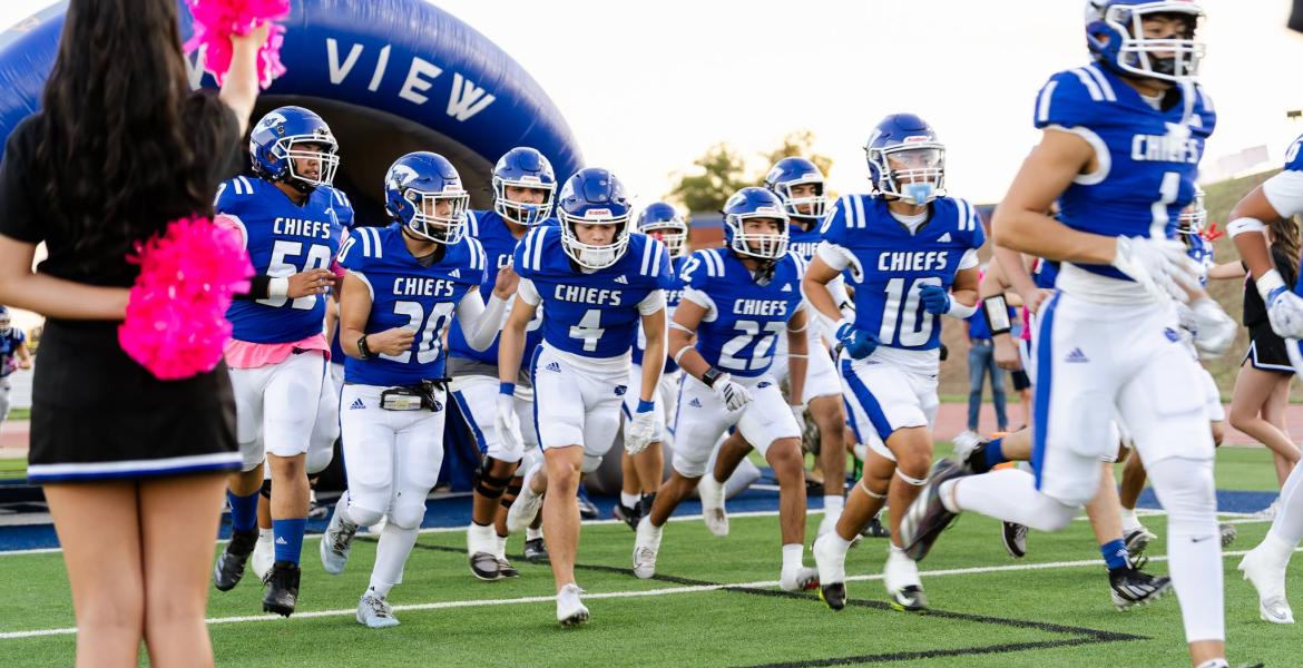 The Lake View Chiefs run onto the field before their game against Pflugerville Connally on Friday, Oct. 9, 2026.